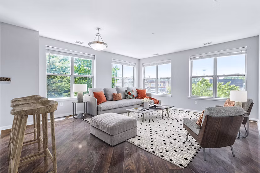 Cozy living room with modern decor at Rutherford Station Apartments
