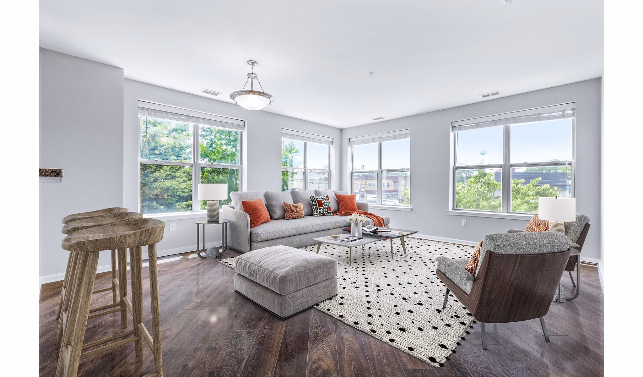 Cozy living room with modern decor at Rutherford Station Apartments