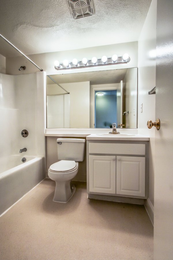 Bathroom featuring sleek fixtures and modern design at Avana Weymouth Apartments