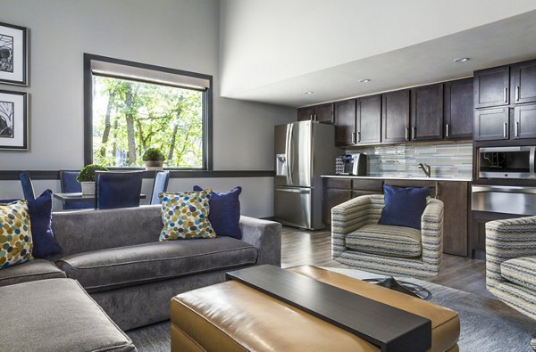 Clubhouse featuring modern design and ample seating at Avana Weymouth Apartments