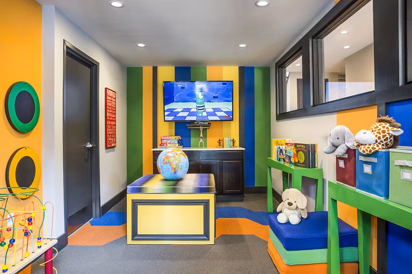 Family-friendly clubhouse with daycare amenities at Avana Weymouth Apartments