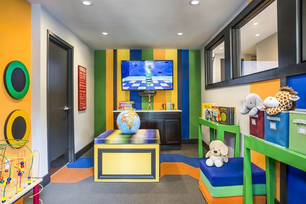 Family-friendly clubhouse with daycare amenities at Avana Weymouth Apartments