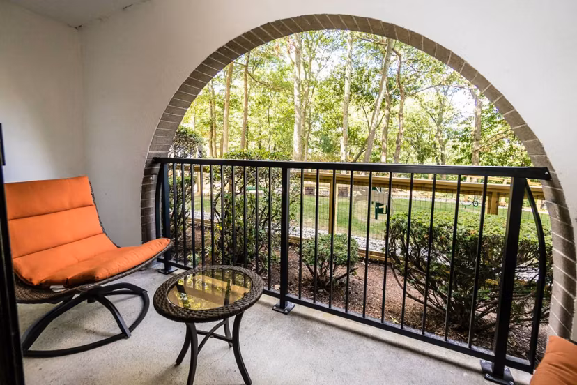 Relaxing patio with comfortable seating at Avana Weymouth Apartments