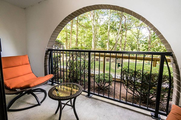 Relaxing patio with comfortable seating at Avana Weymouth Apartments