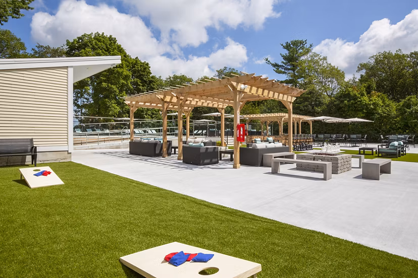Sport court for basketball and tennis at Avana Weymouth Apartments, featuring well-maintained surfaces and lighting for sports enthusiasts