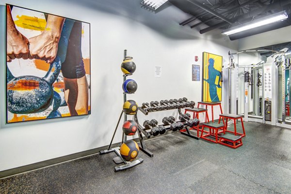 State-of-the-art fitness center at VUE25 Apartments with modern equipment and vibrant workout spaces for a healthy lifestyle