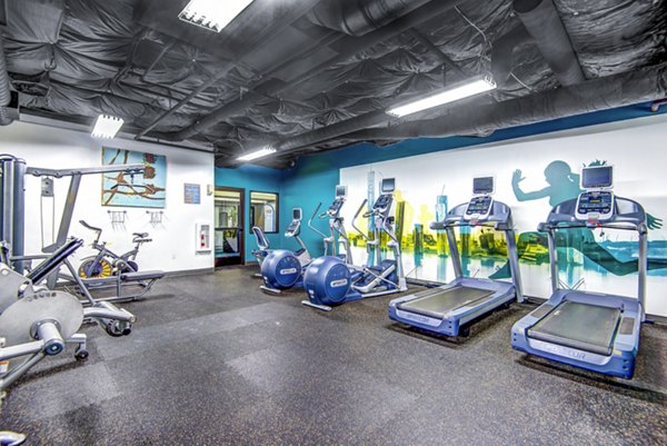 Modern fitness center with state-of-the-art equipment at VUE25 Apartments