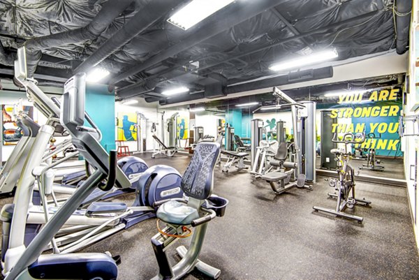 Modern fitness center with state-of-the-art equipment at VUE25 Apartments in Tacoma