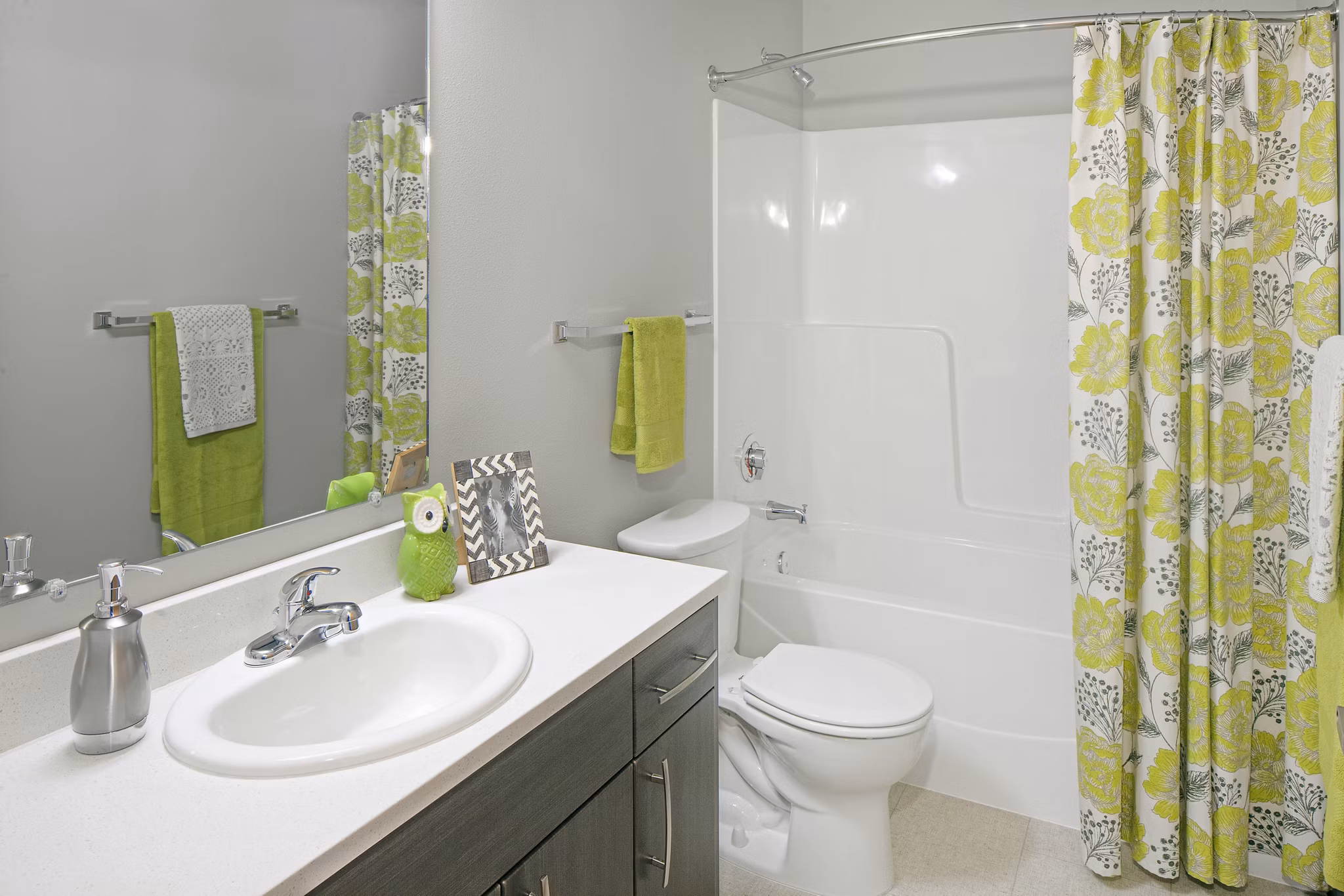 Modern bathroom with sleek fixtures at The Tennyson at Crescent Village Apartments