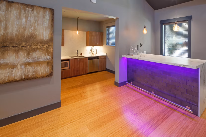 The Tennyson at Crescent Village: Elegant clubhouse featuring modern decor and comfortable seating in upscale luxury apartments
