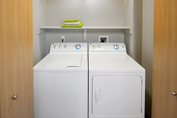 laundry room at The Tennyson at Crescent Village Apartments