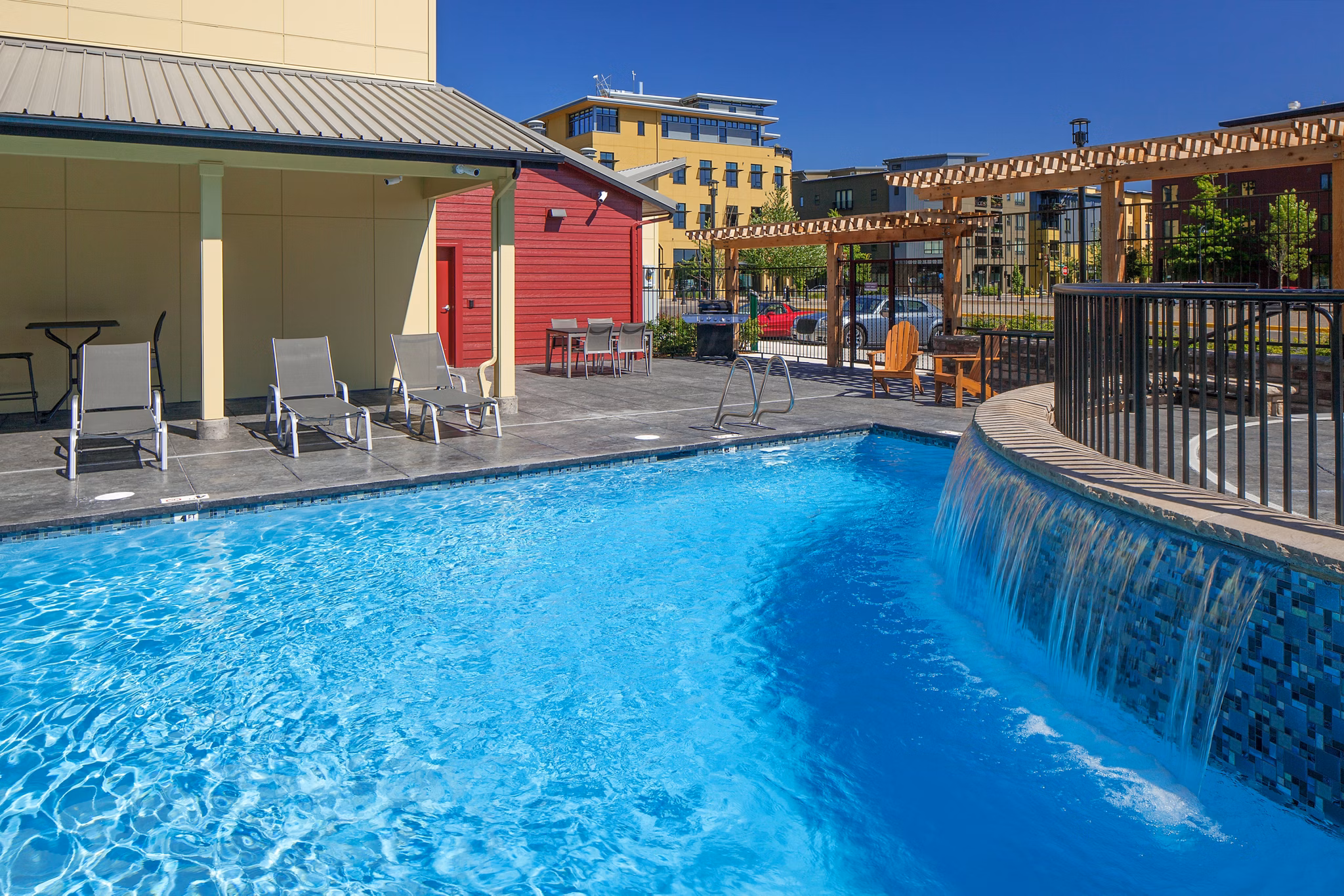 Rooftop pool offering serene views at The Tennyson at Crescent Village luxury apartments