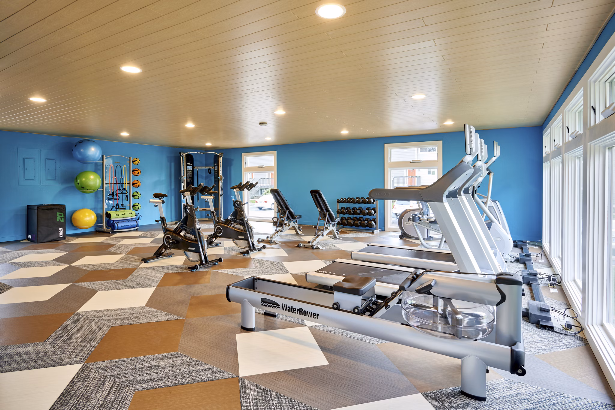 State-of-the-art fitness center featuring modern equipment at Lineage at Willow Creek Apartments