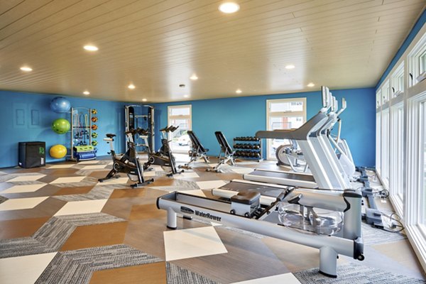 State-of-the-art fitness center featuring modern equipment at Lineage at Willow Creek Apartments