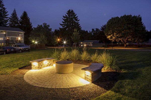 Serene courtyard area with lush landscaping at Lineage at Willow Creek luxury apartments