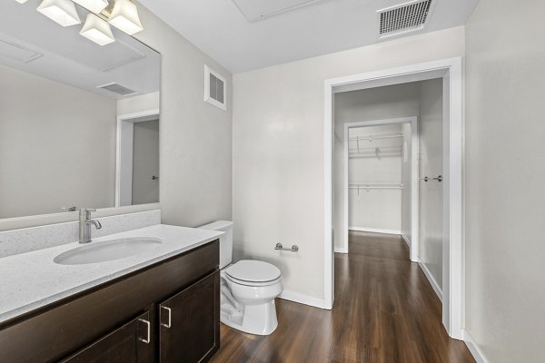 Stylish bathroom with sleek fixtures at Confluence at Three Springs Apartments offering luxury living