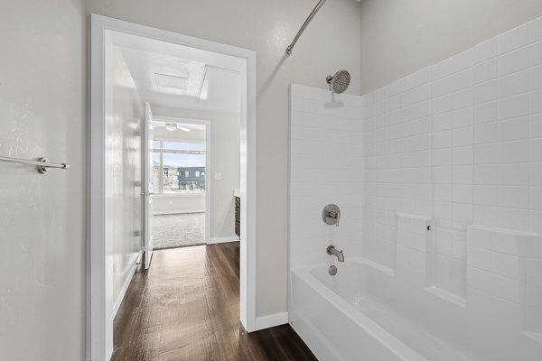 Modern bathroom with sleek fixtures at Confluence at Three Springs Apartments