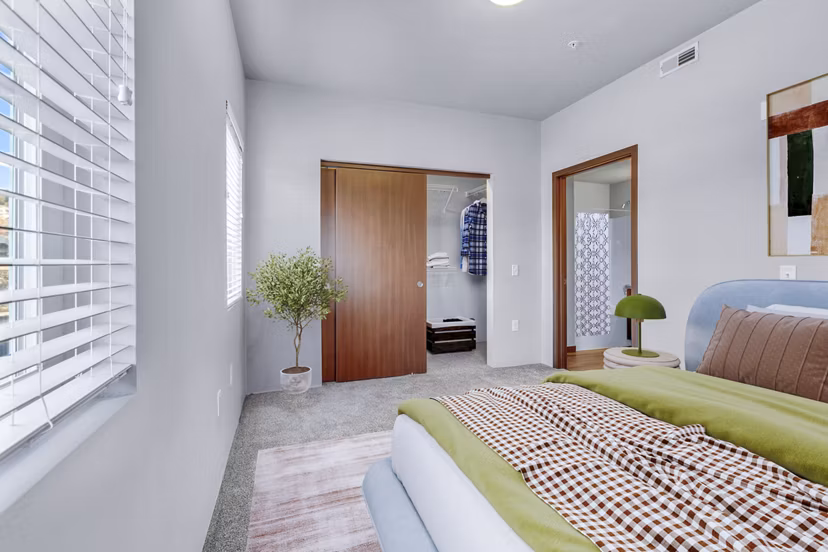 Cozy bedroom with modern decor in Jake at Indian Trail Apartments