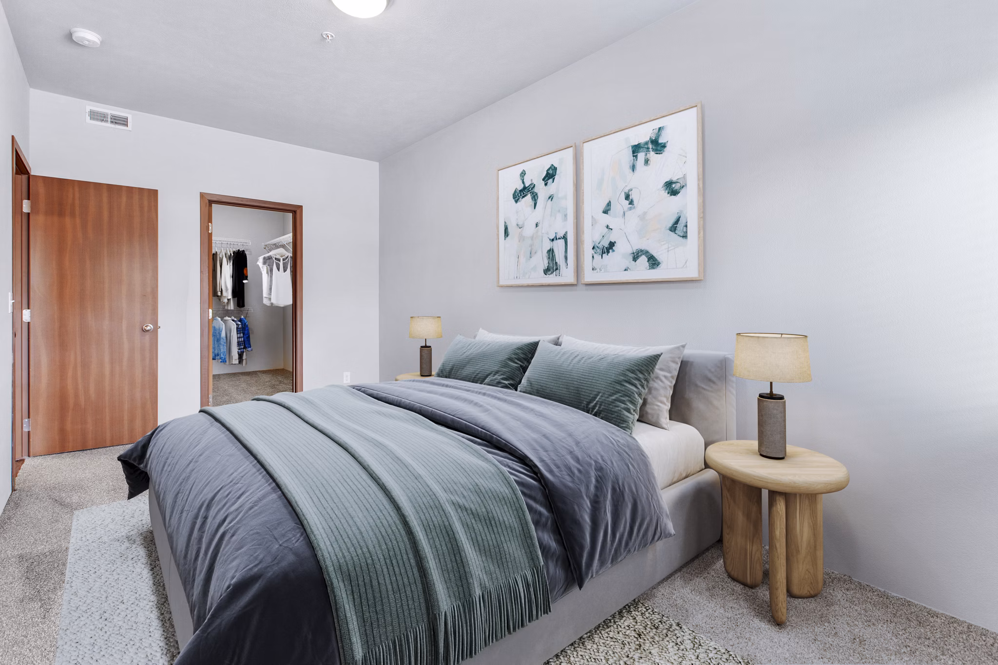 Elegant bedroom featuring modern furnishings and natural light at Jake at Indian Trail Apartments