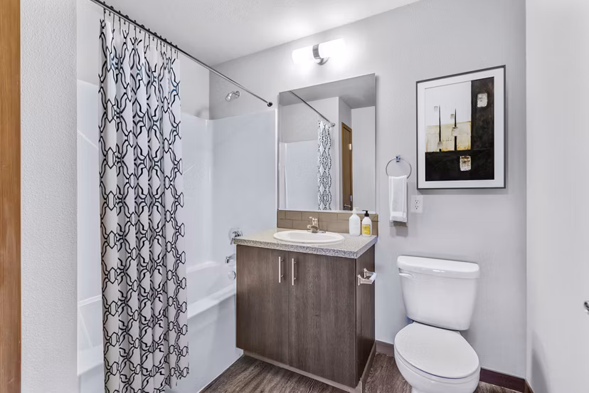 Modern bathroom featuring sleek fixtures at Jake at Indian Trail Apartments