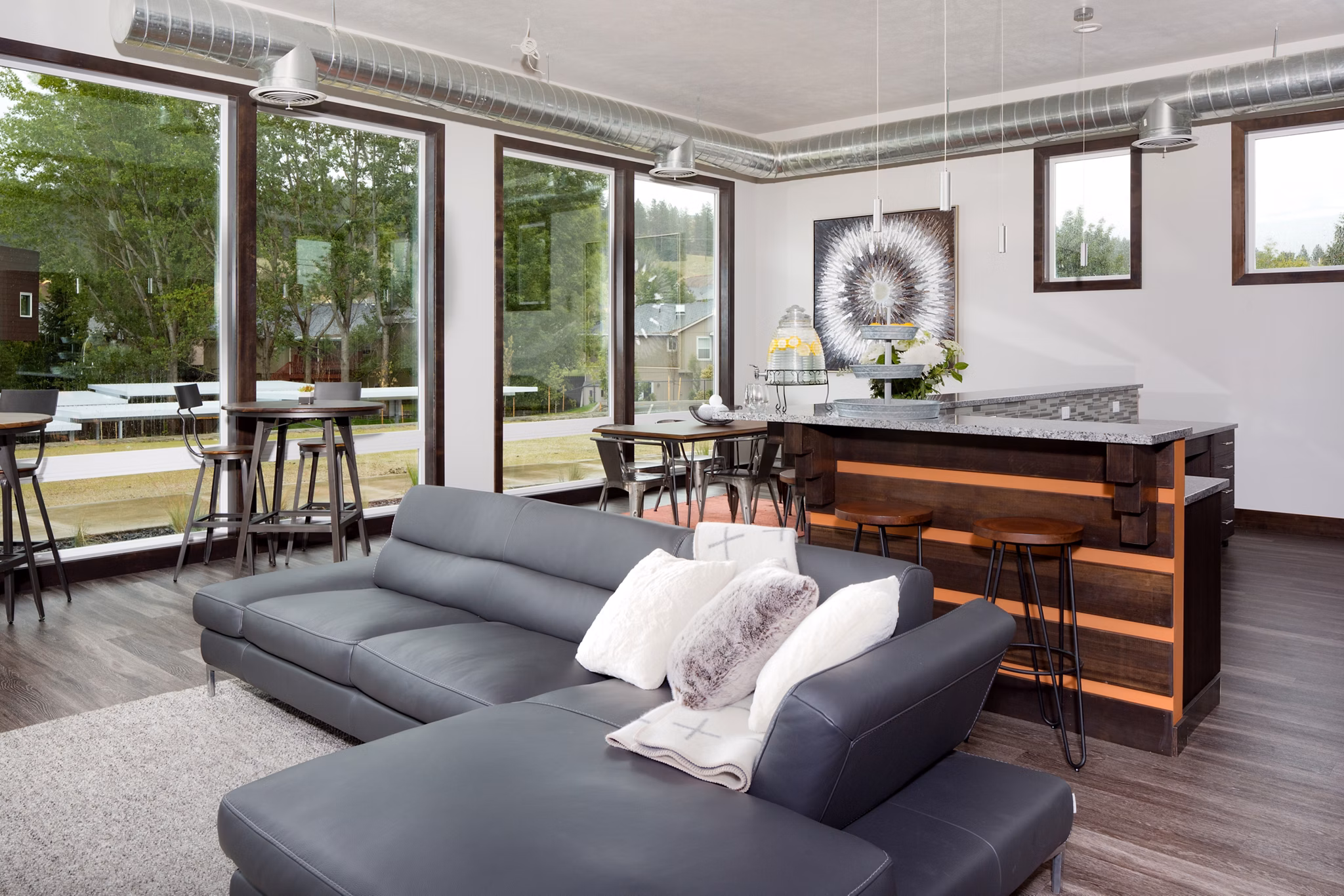 Clubhouse with modern seating and billiards at Jake at Indian Trail Apartments