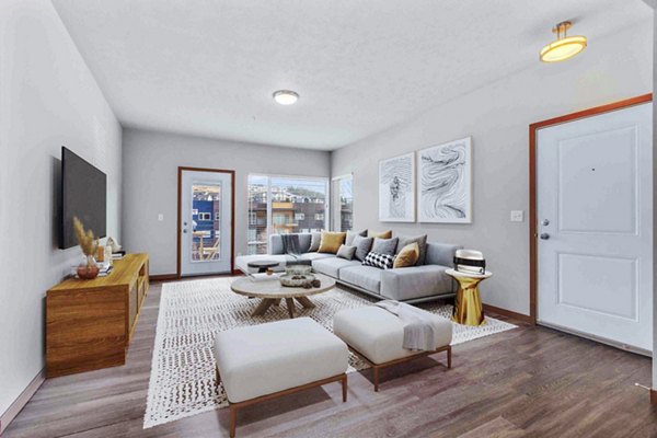 Spacious living room with modern decor at Jake at Indian Trail Apartments