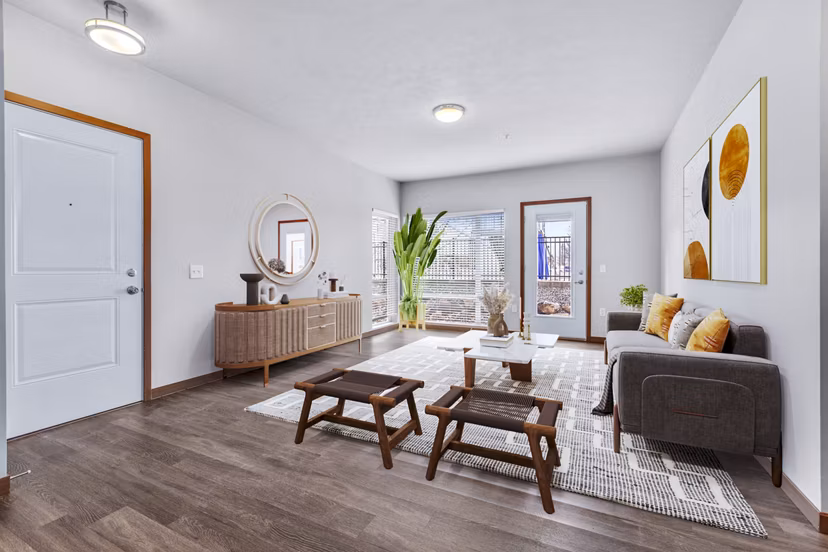 Spacious living room with modern furnishings at Jake at Indian Trail Apartments