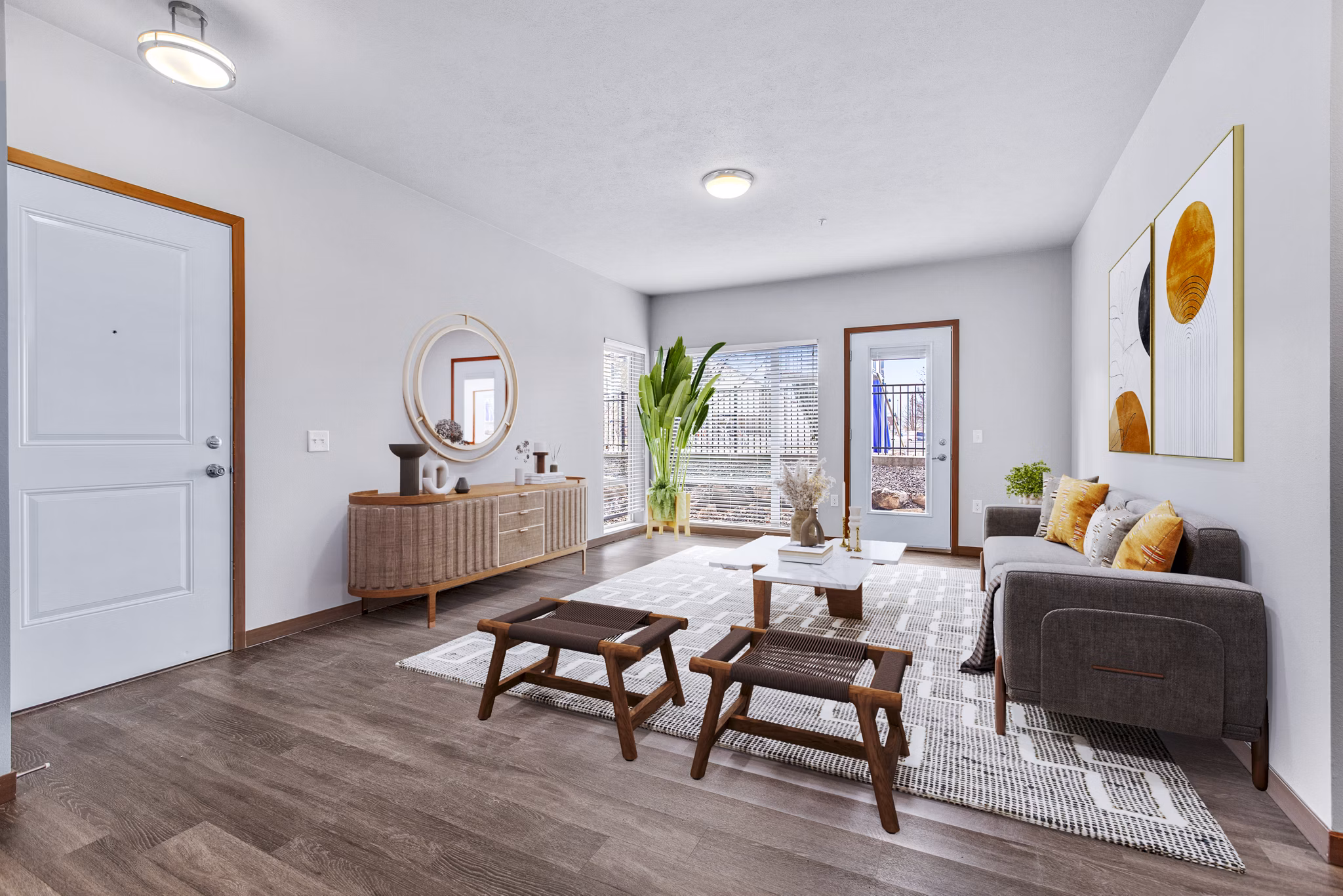 Spacious living room with modern furnishings at Jake at Indian Trail Apartments