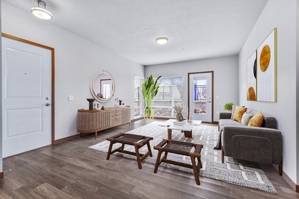 Spacious living room with modern furnishings at Jake at Indian Trail Apartments