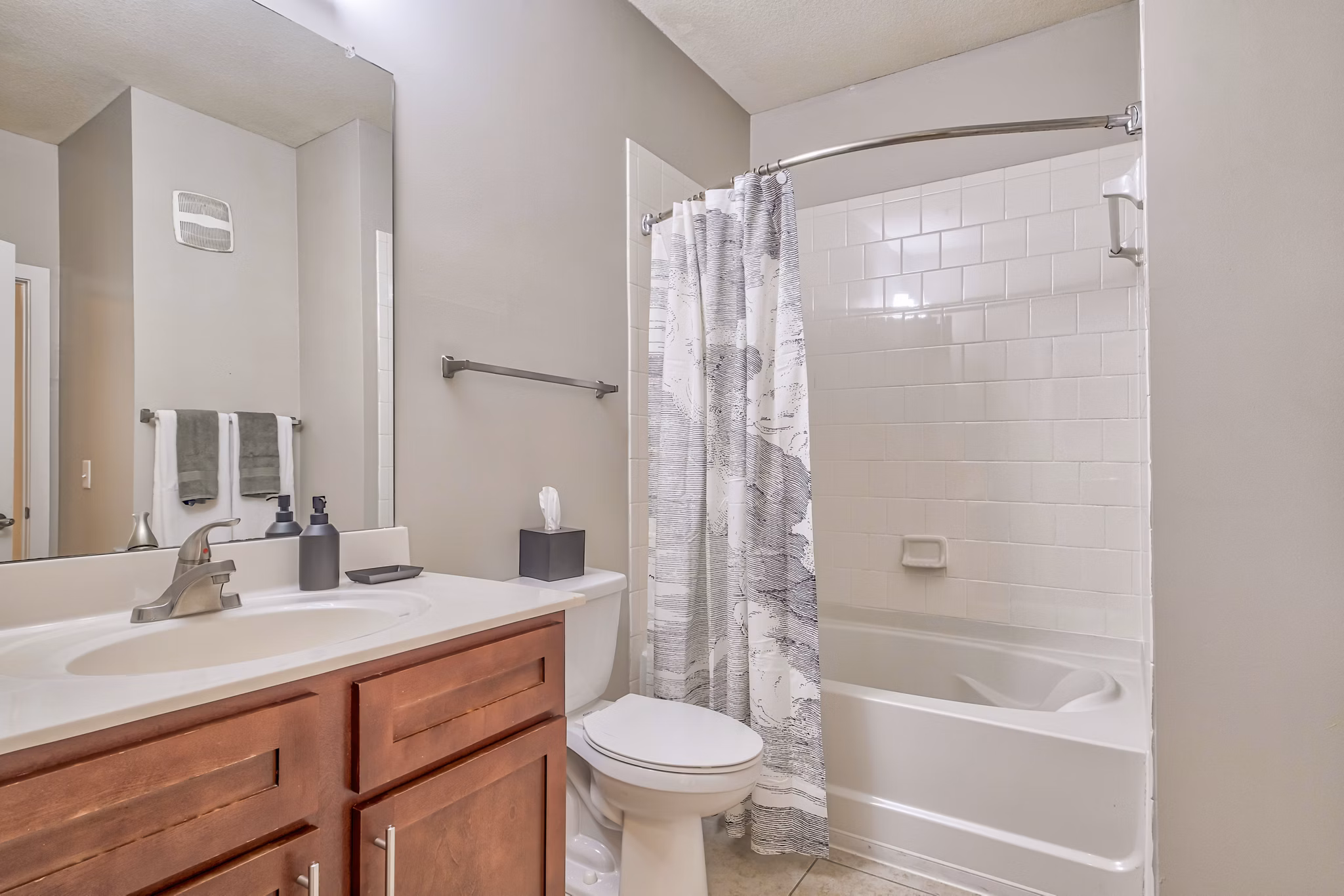 Luxurious bathroom with modern fixtures at River Oaks Apartments