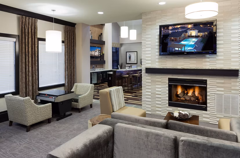 Clubhouse featuring modern decor and seating at River Oaks Apartments