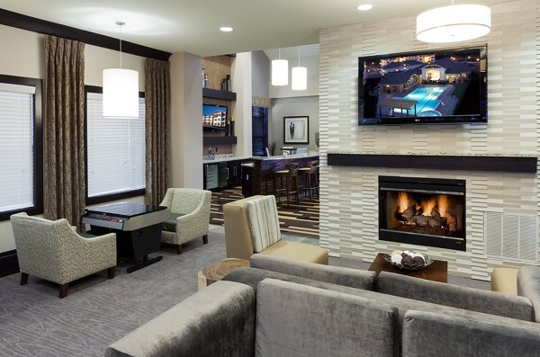 Clubhouse featuring modern decor and seating at River Oaks Apartments