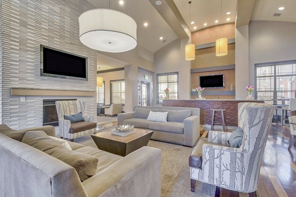 Clubhouse featuring modern design and community seating at River Oaks Apartments
