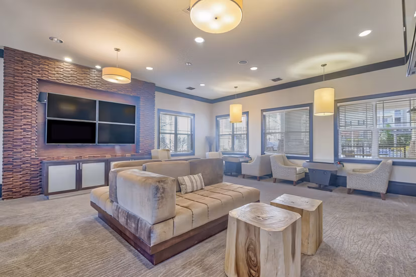 Modern clubhouse with contemporary design at River Oaks Apartments, providing luxury amenities for residents to enjoy social gatherings