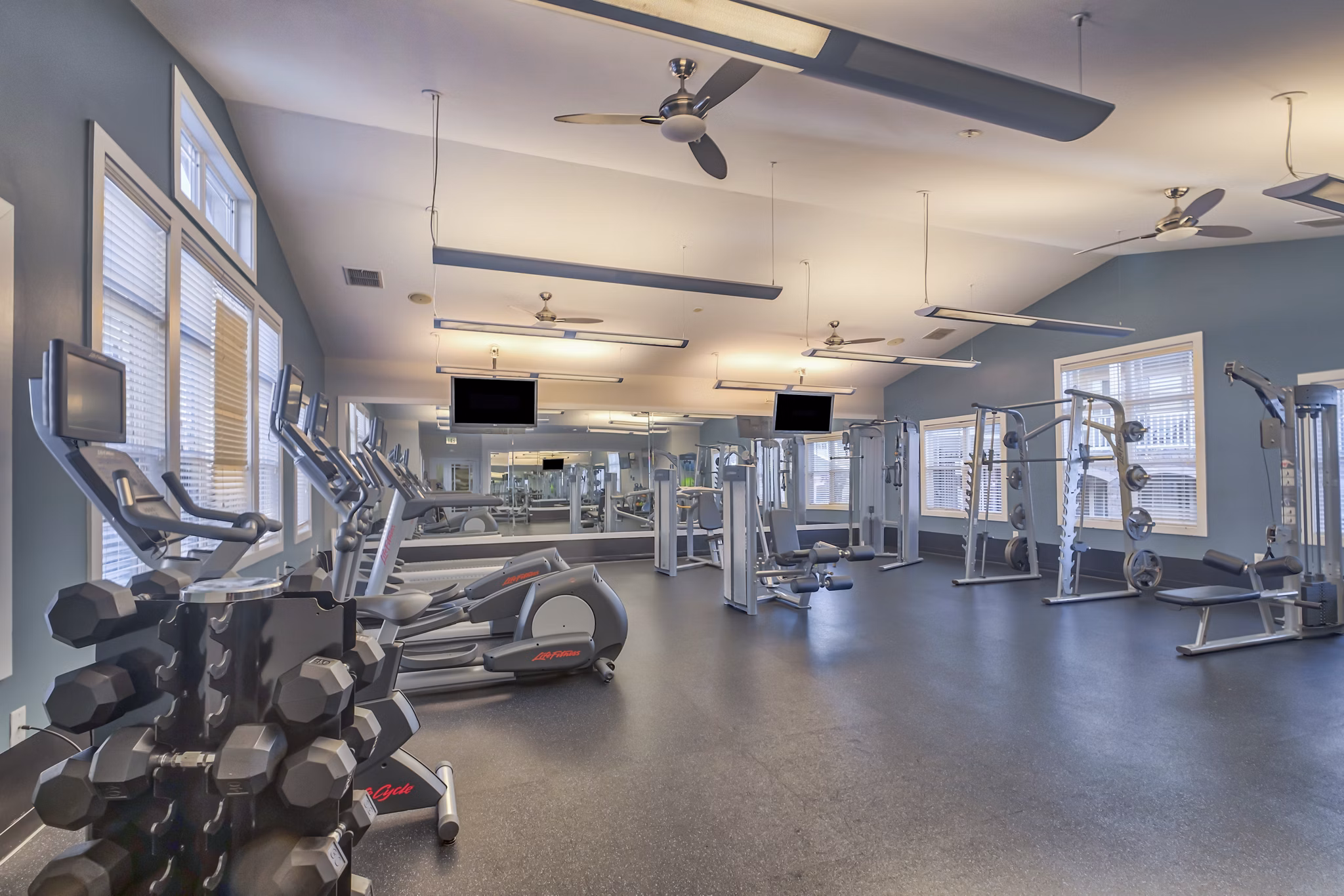 State-of-the-art fitness center with modern equipment at River Oaks Apartments offering luxury living experiences
