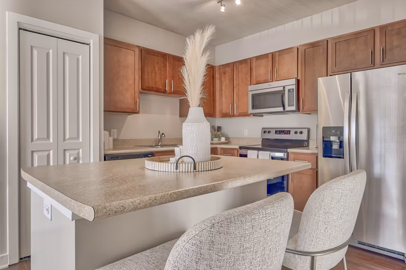 Spacious kitchen with modern appliances at River Oaks Apartments