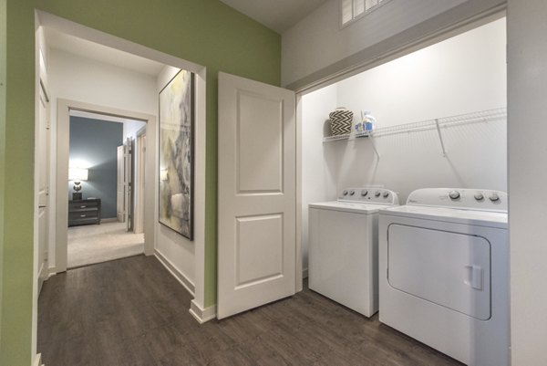 laundry room at Eastbank at Waterside Apartments