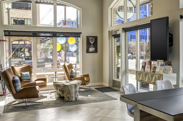 Elegant modern clubhouse with plush seating at Waterline Apartments offering luxury living spaces