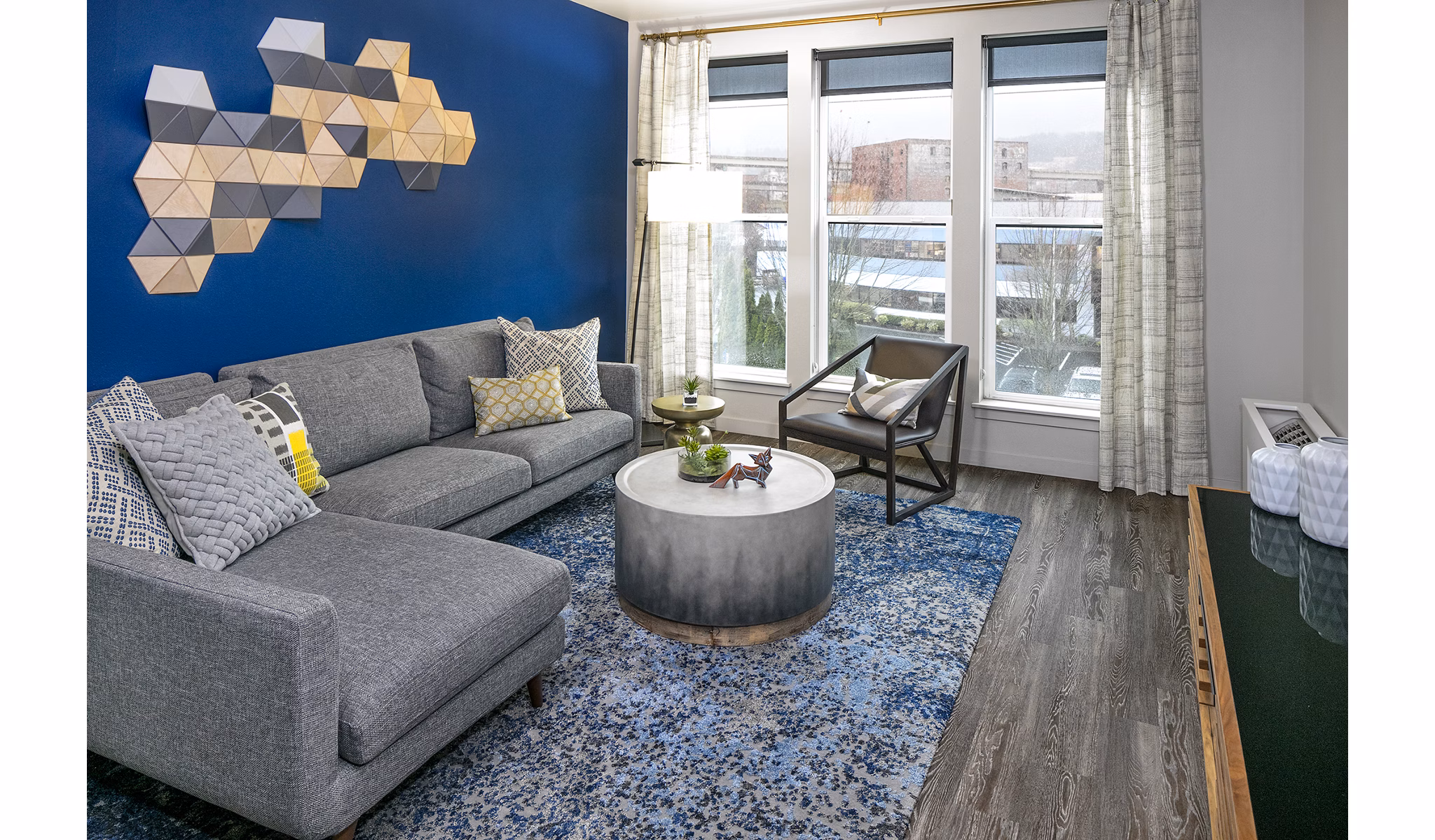 Spacious living room with contemporary furniture in Waterline Apartments, perfect for luxury urban living
