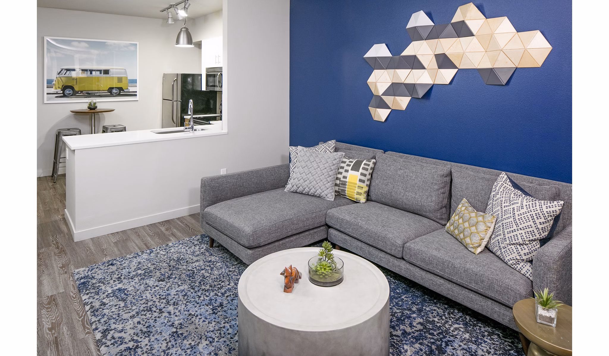 Spacious living room with contemporary furnishings in Waterline Apartments, offering luxury living in a prime city location