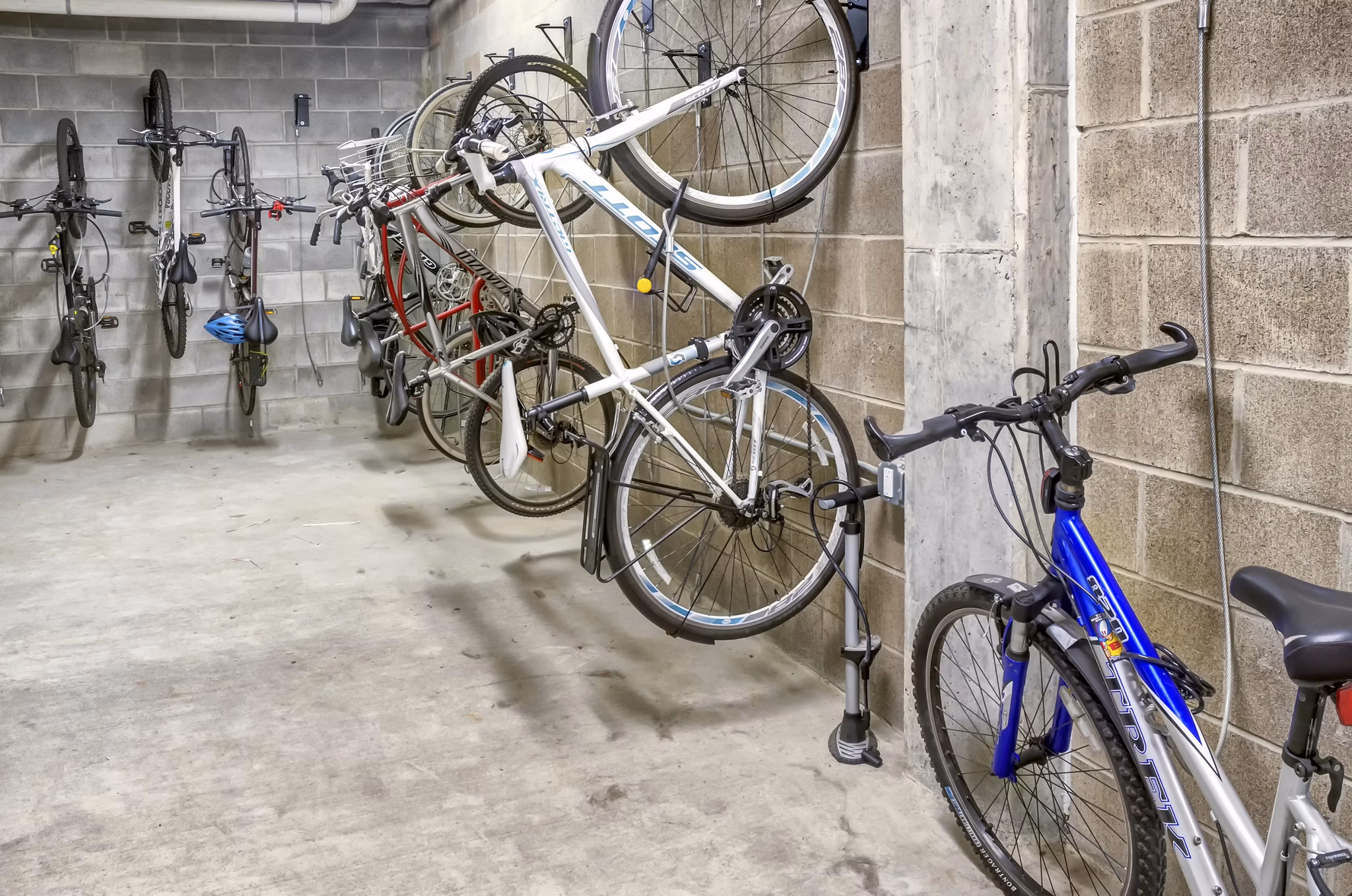 Secure bike storage facility at Waterline Apartments featuring racks and CCTV for resident convenience