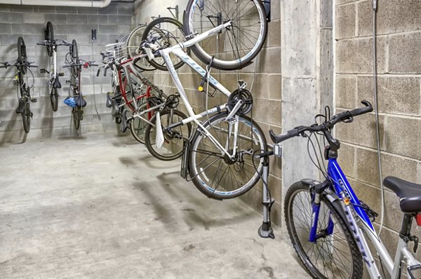 Secure bike storage facility at Waterline Apartments featuring racks and CCTV for resident convenience