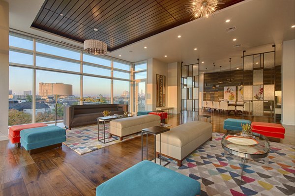 Elegant clubhouse featuring modern decor at One Hermann Place Apartments in Houston