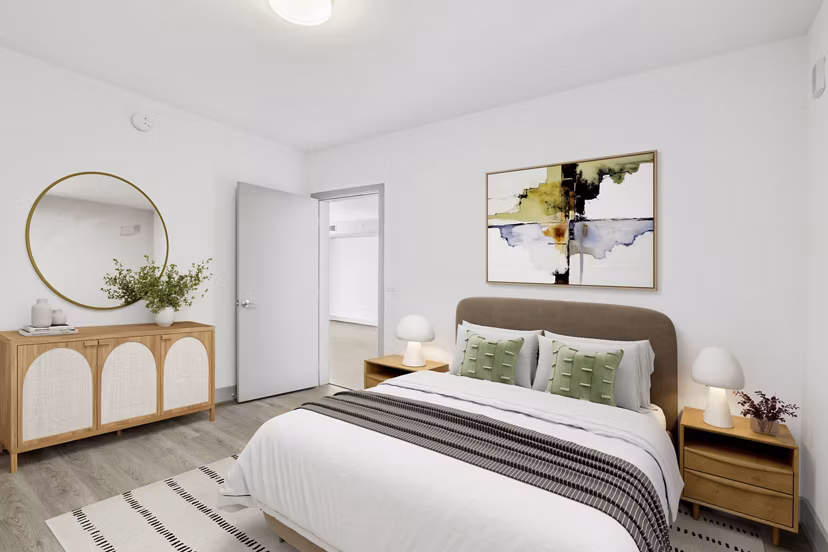 Spacious bedroom with modern decor at Adaire Apartments