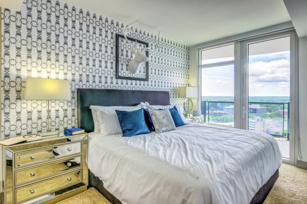 Spacious bedroom with modern decor at Adaire Apartments