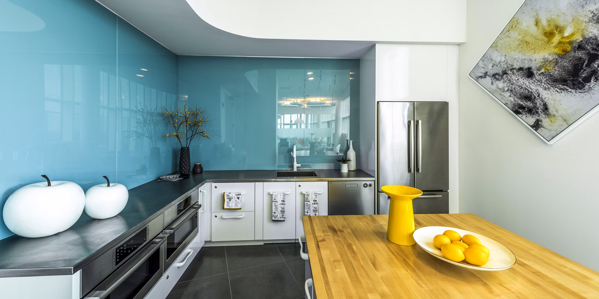 Clubhouse with modern furnishings and entertainment areas at Adaire Apartments, a luxury property