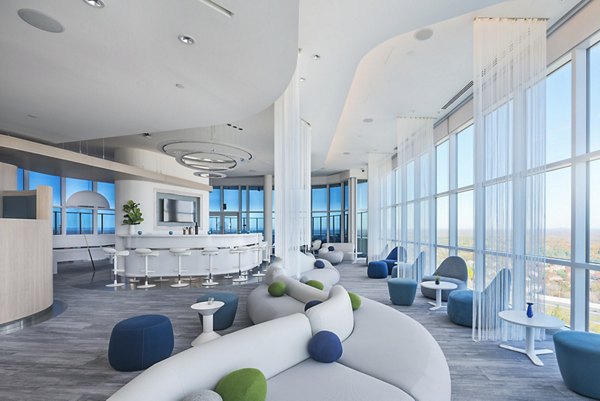 Modern clubhouse featuring stylish lounge and fitness area at Adaire Apartments in a vibrant community setting