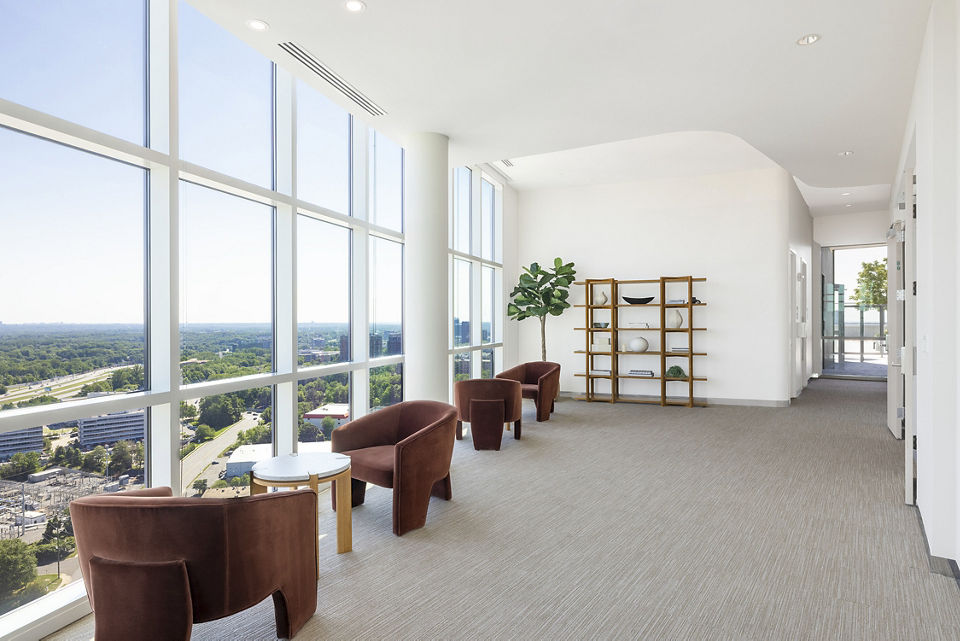 Modern clubhouse featuring stylish lounge and fitness area at Adaire Apartments in a vibrant community setting