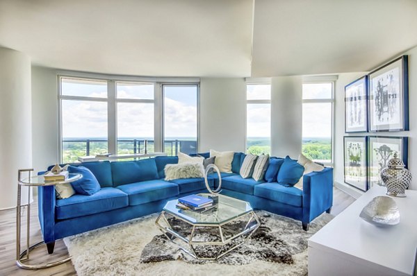 Spacious living room with modern decor at Adaire Apartments