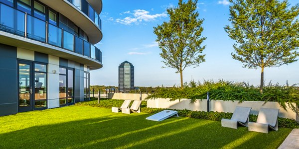 Stunning rooftop amenities including lounge seating and city views at Adaire apartments